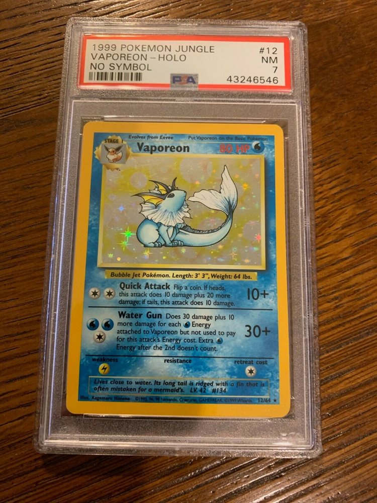 psa 7 nm vaporeon 12 64 error no symbol holo jungle set collectors com